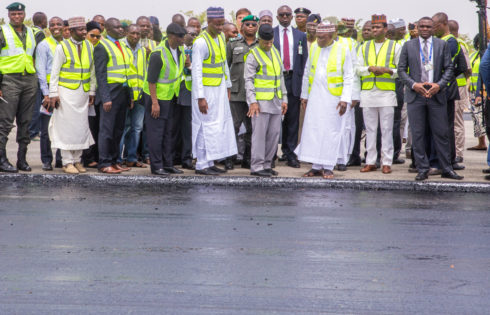 L-R: Vice President Prof. Osinbajo SAN; DG NCAA Capt. Muhktar Usman and a Transport Ministry Official during the Abuja airport runway inspection by the Vice President. 7th April 2017. Photo: Novo Isioro.