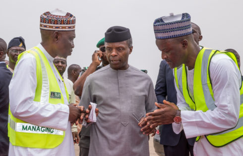 L-R: Vice President Prof. Osinbajo SAN; DG NCAA Capt. Muhktar Usman and a Transport Ministry Official during the Abuja airport runway inspection by the Vice President. 7th April 2017. Photo: Novo Isioro.