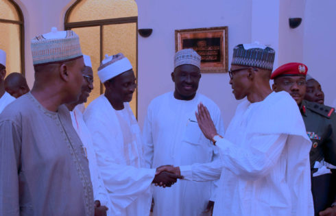 President Muhammadu Buhari with SSAP Domestic and Social Events, Sarki Abba and Senator Mustapha Bukar after Juma'at prayer at the Aso Villa in Abuja. PHOTO; SUNDAY AGHAEZE. APRIL 21 2017..