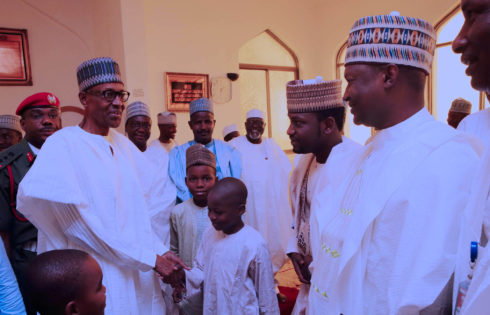 President Muhammadu Buhari chats with Minister of Justice and Attorney General of the Federation, Abubakar Malami  and Children after Juma'at prayer at the Aso Villa in Abuja. PHOTO; SUNDAY AGHAEZE. APRIL 21 2017.