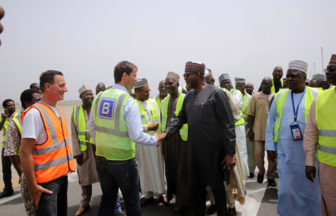 Minister of State Aviation Senator Hadi in a handshake with Julius Berger Division CES, Dr. Lars Richter for a good job as the Nnamdi Azikwe International Airport rehabilitation of the runway reopens 24 hours before schedule time n Abuja. PHOTO; SUNDAY AGHAEZE. APR 18 2017