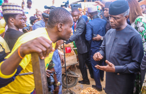 VP Osinbajo interacts with beneficiaries of the trader moni program. 