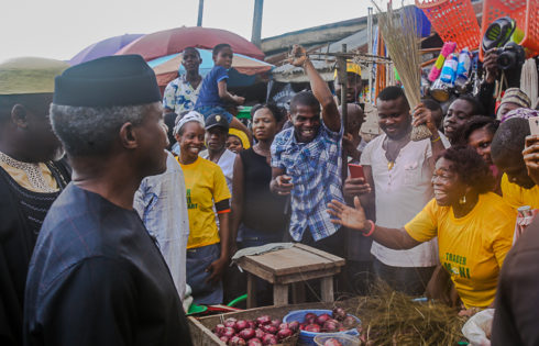 VP Osinbajo interacts with beneficiaries of the trader moni program. 