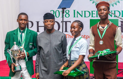 VP Osinbajo with students who won the Mini Photo Exhibition Competition.