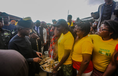 VP Osinbajo interacts with beneficiaries of the trader moni program. 