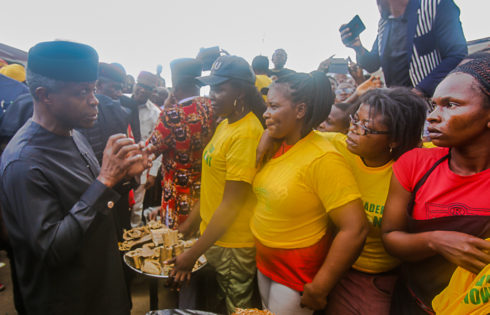 VP Osinbajo interacts with beneficiaries of the trader moni program. 