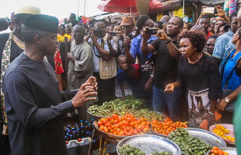 VP Osinbajo interacts with beneficiaries of the trader moni program. 