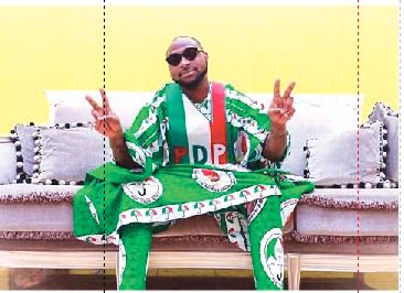 DAVIDO wears PDP Agbada on uncle’s campaign