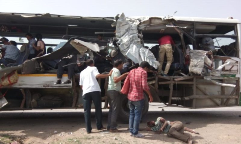 13 die as passenger bus collides with truck