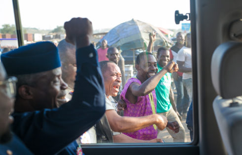 VP Osinbajo acknowledges cheers from crowd.