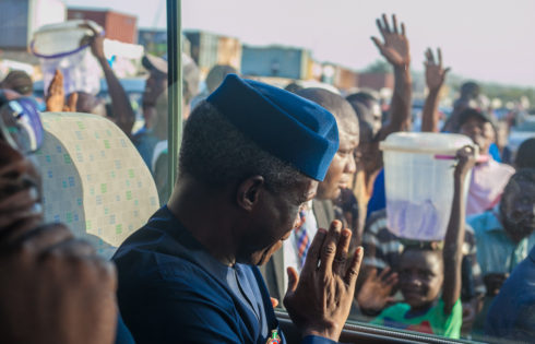 VP Osinbajo acknowledges cheers from crowd.