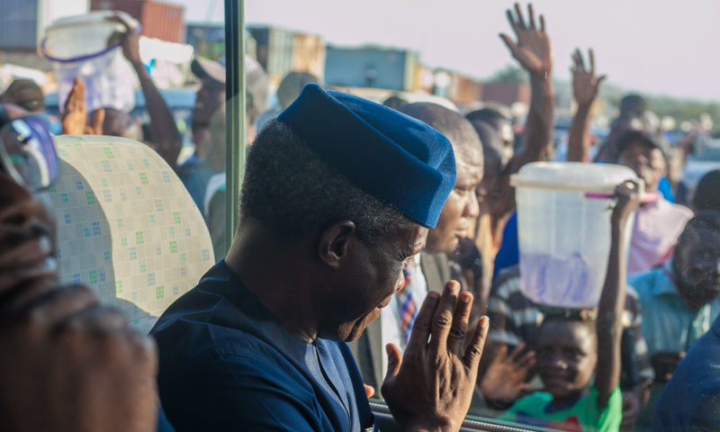 Vice President Yemi Osinbajo, SAN, takes Market Moni; a N50,000 minimum micro credit for artisans and traders to Apo Mechanic Village, Abuja.