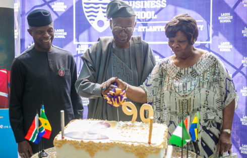 VP Osinbajo with celebrant & guest of Honour, Chief Olu Akinkugbe and Wife.