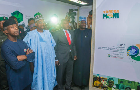 VP Osinbajo with Chairman - BOI, Mr. Abdulraman Dikko (1R); Managing Director, Mr. Olukayode A. Pitan (R) during the inspection of Trader Moni command centre.