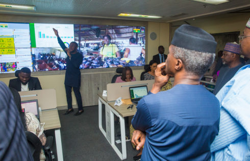 VP Osinbajo with Chairman - BOI, Mr. Abdulraman Dikko (1R); Managing Director, Mr. Olukayode A. Pitan (R) during the inspection of Trader Moni command centre.