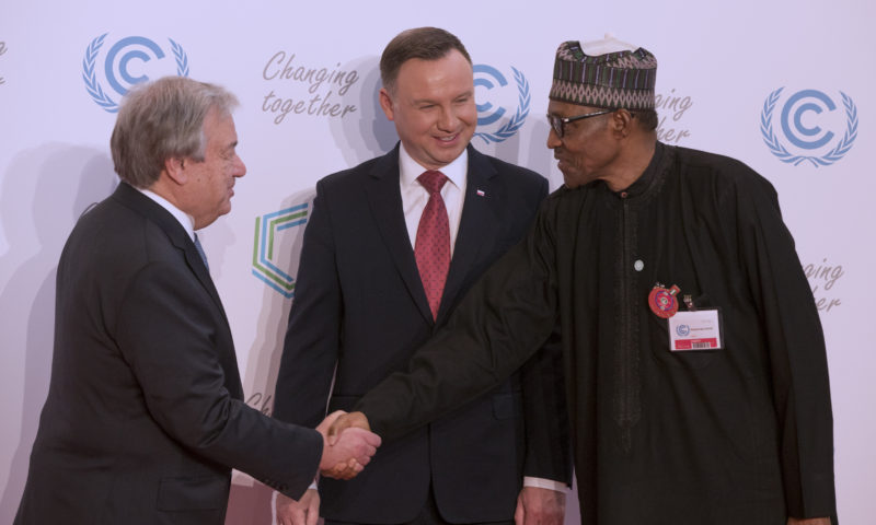 PRESIDENT BUHARI IN A HANDSHAKE WITH UN SEC=GEN GUTERRES AT COP24