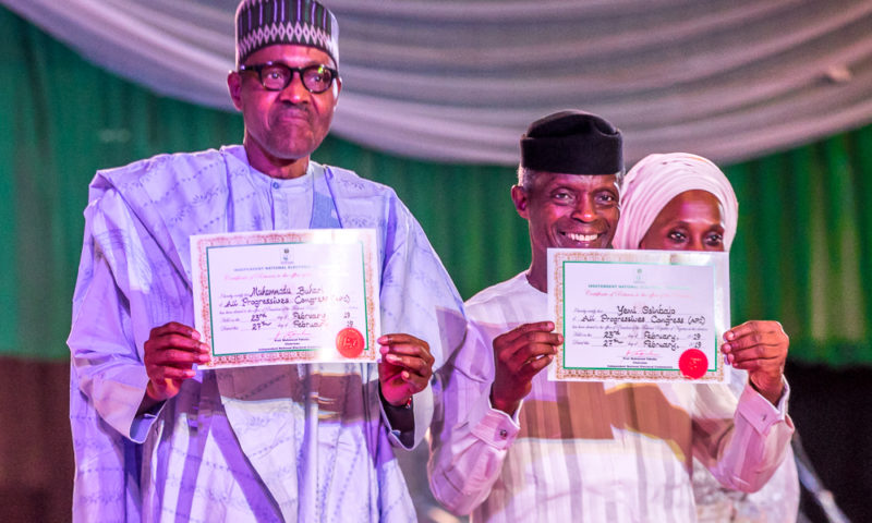 President Muhammadu Buhari, GCFR, and Vice President Yemi Osinbajo, SAN, receive Certificate of Return from INEC on their re-election in Abuja. 27th, February 2019.