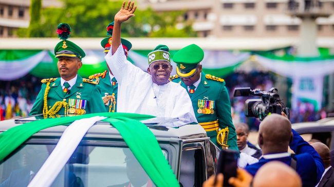 [VIDEO] Tinubu slips while boarding presidential parade vehicle at Eagles Square