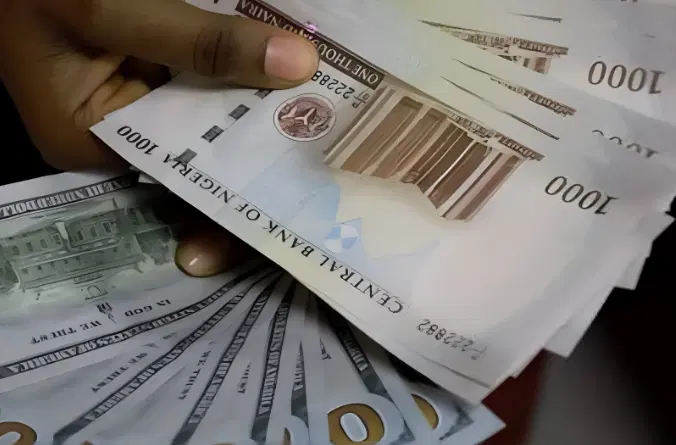 Naira gains N35.32 against dollar at official market