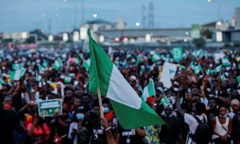 Nigeria @64: FG plans low-key celebration as Nigerian youths protest against hunger